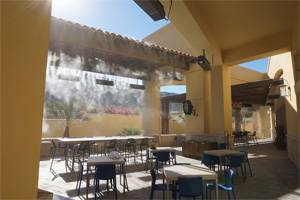 Outdoor restaurant patio with misting system
